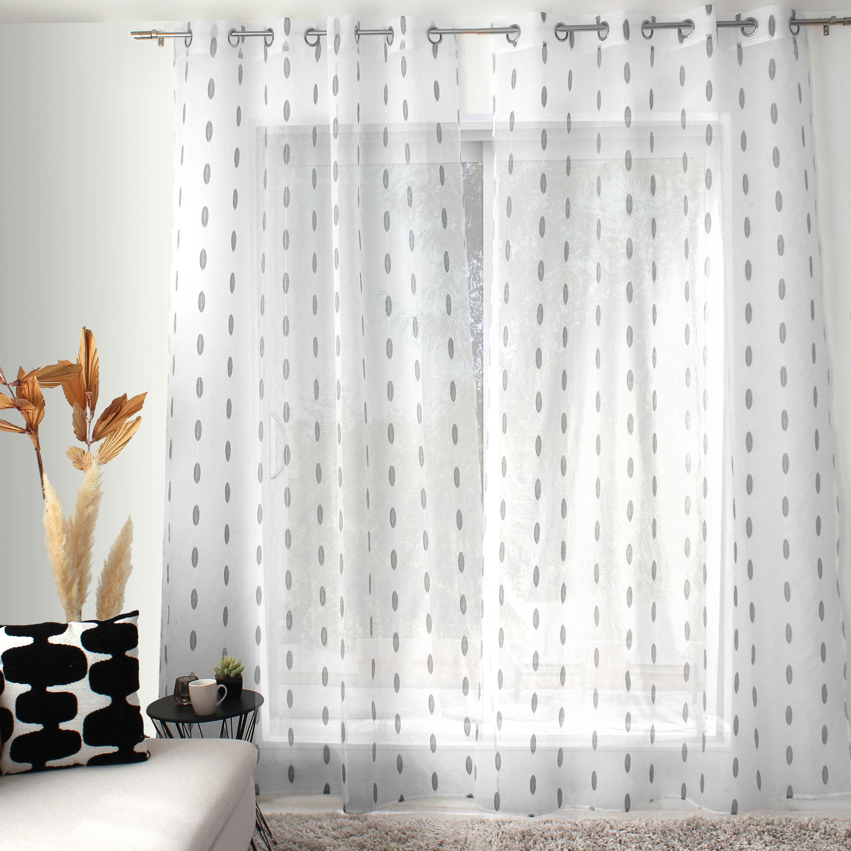 Voilage jacquard à pois ovales à oeillets