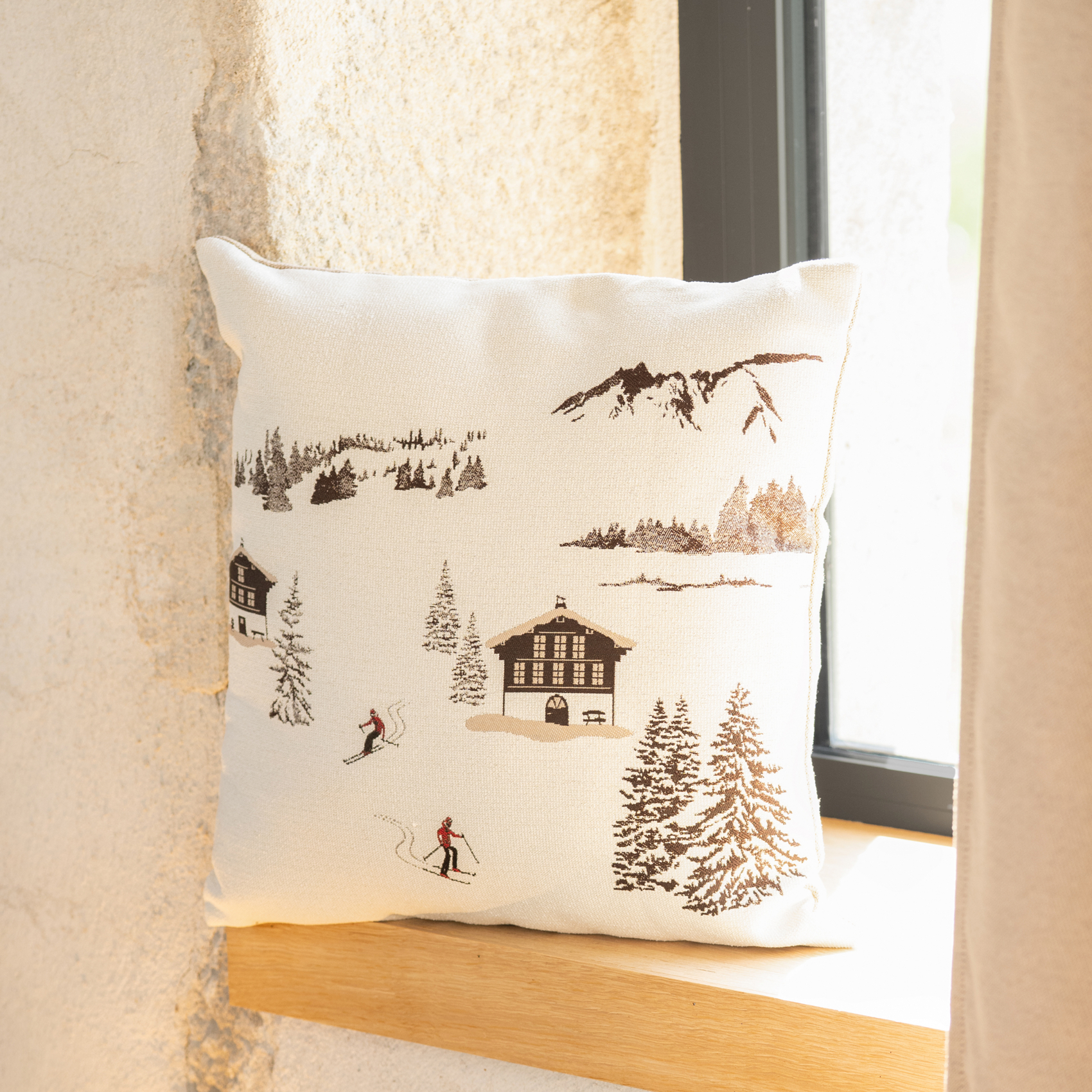 Coussin jacquard avec motif chalets