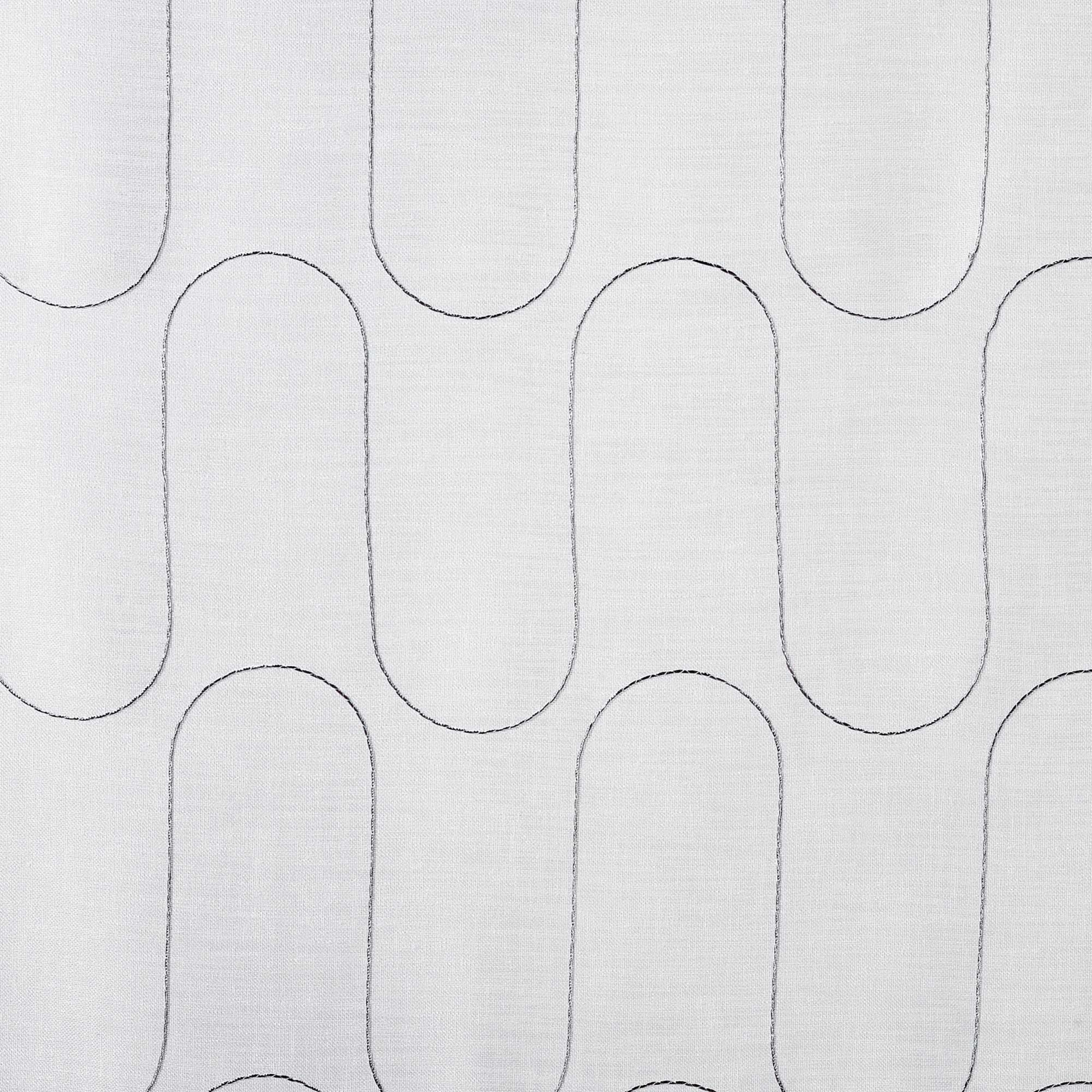 Tissu brodé et plombé d'un fil guipé