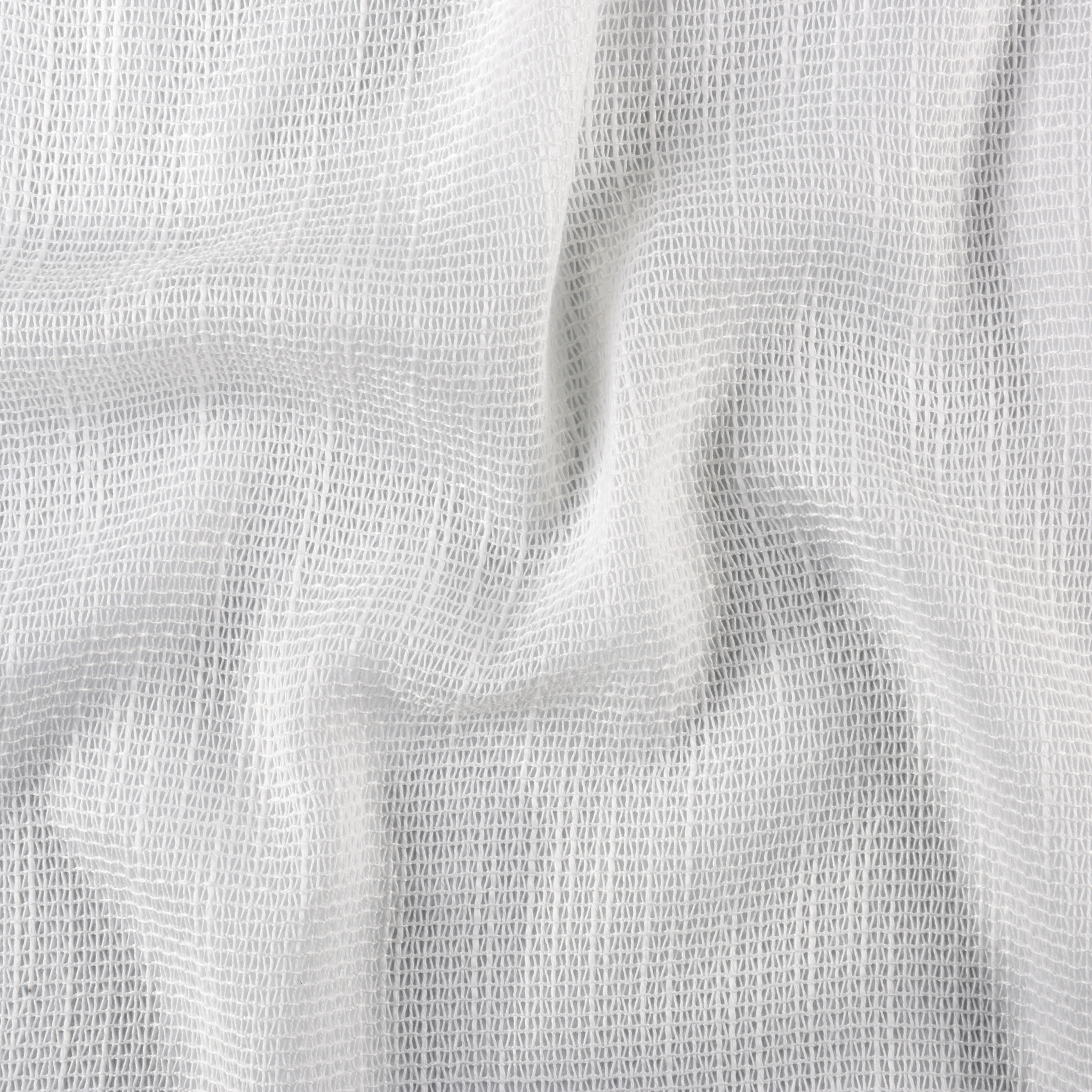 Tissu voilage effet filet ajouré style crochet