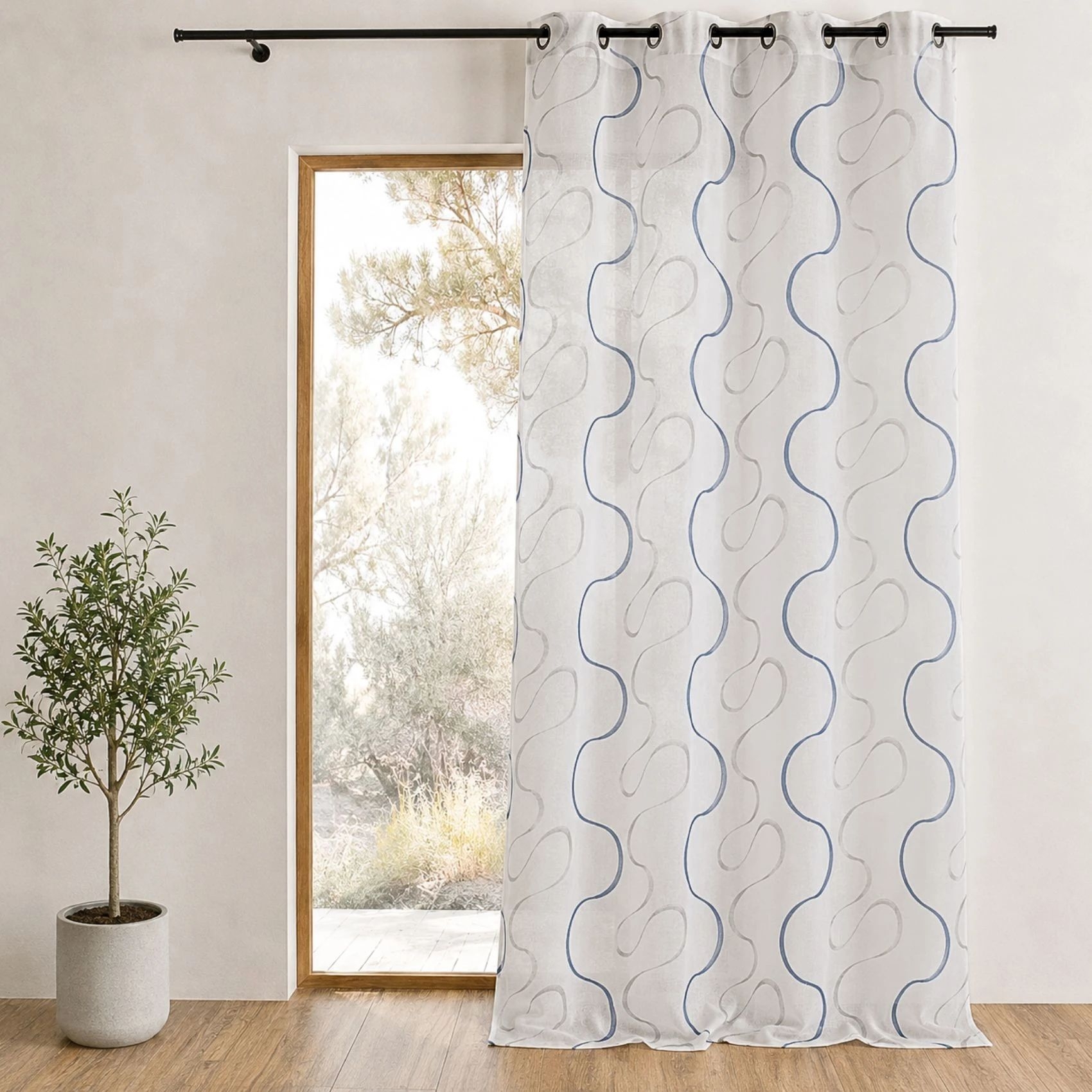 Voilage brodé à motifs ondulés