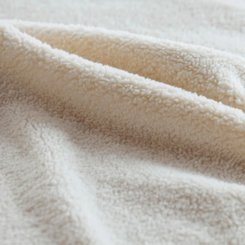 Tissu sherpa effet peau de mouton