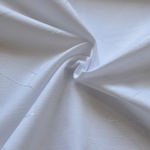 Tissu de nappage damassé à motifs géométriques