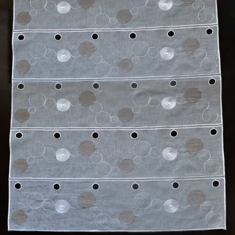 Modulable brodé de guirlandes circulaires