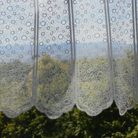 Brise bise en maille et aux cercles ajourés