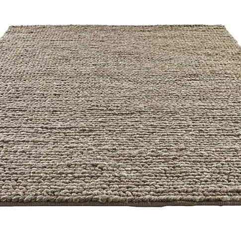 tapis tressé laine