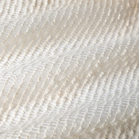Tissu filet à motif bouclette et bas plombé