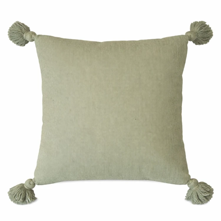 Copricuscino in lana con nappe