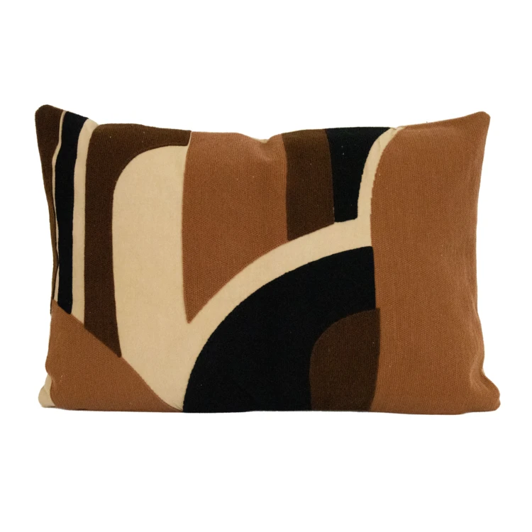 Coussin brodé en relief motif abstrait