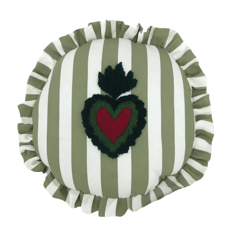 Coussin rond à rayures avec motif cœur brodé