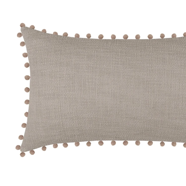 Coussin rectangulaire en coton déhoussable à pompons