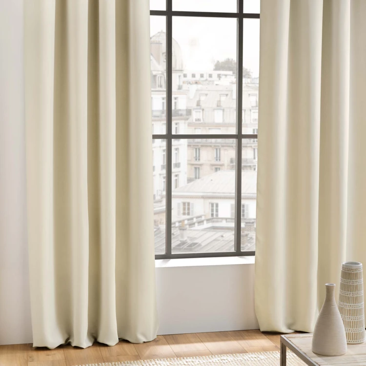 Rideau occultant uni à oeillets