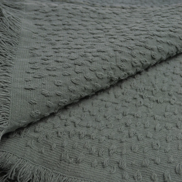 Plaid en coton jacquard à motif goutte d’eau