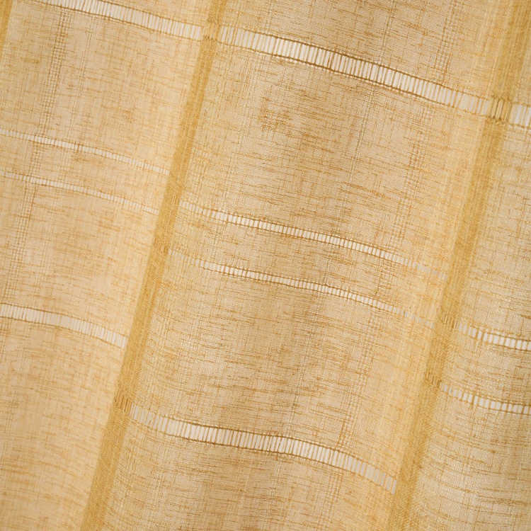 Voilage ajouré à oeillets effet matière