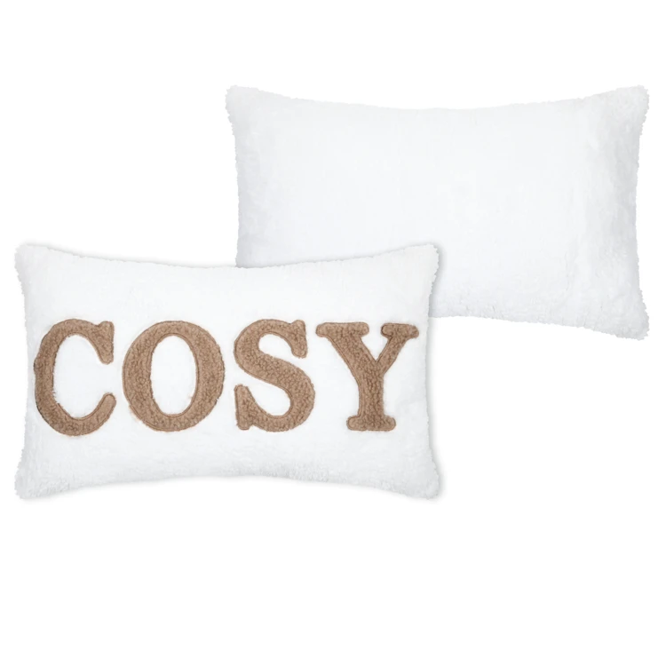 Coussin en polaire avec message brodé "Cosy"