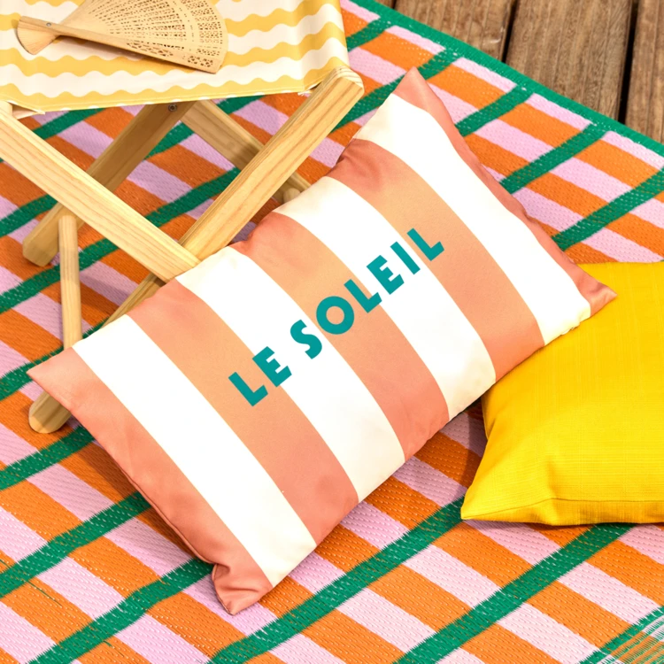 Coussin extérieur rayé "Le soleil"