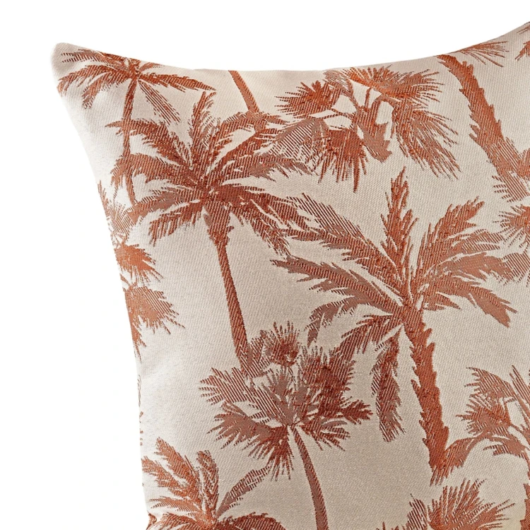 Coussin motif palmier tissé