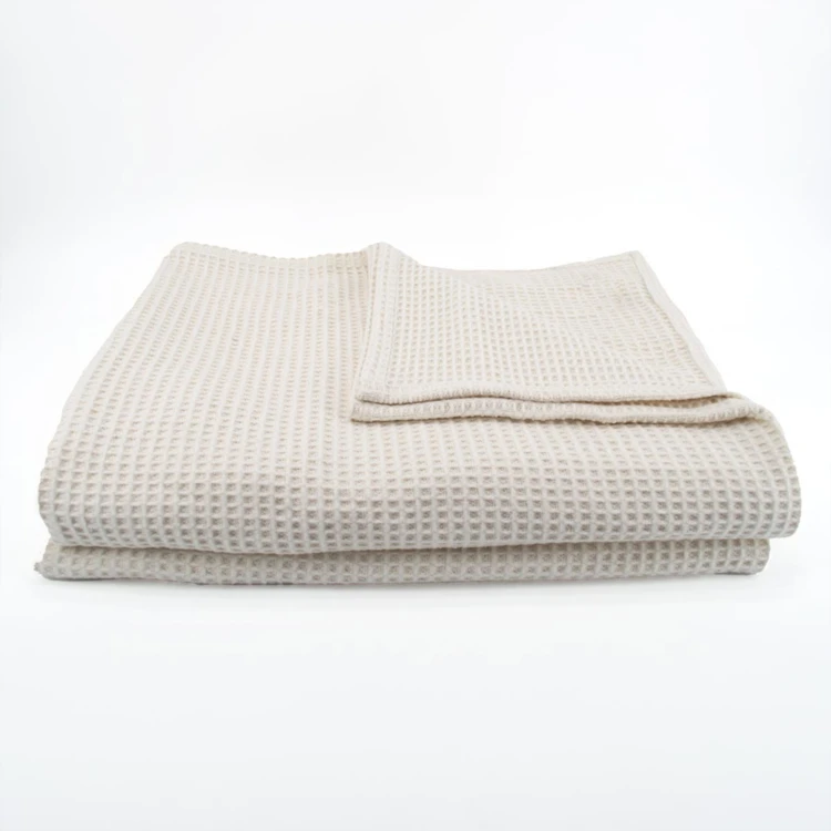 Dessus de lit tissé en coton recyclé motif nid d’abeille