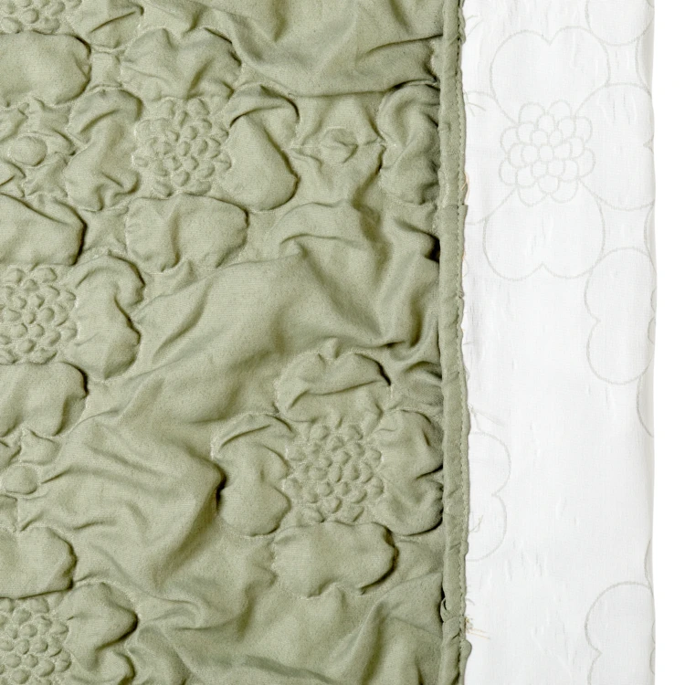 Rideau matelassé à œillets