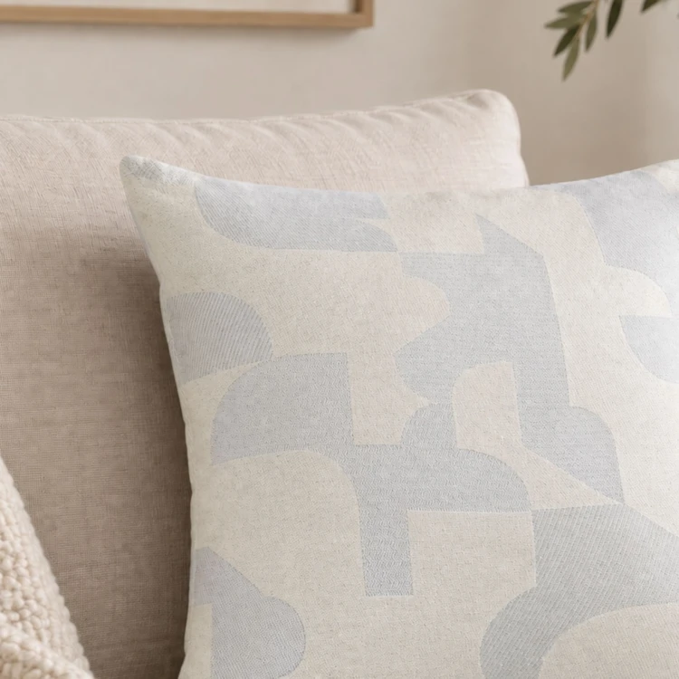 Coussin jacquard géométrique texturé rétro