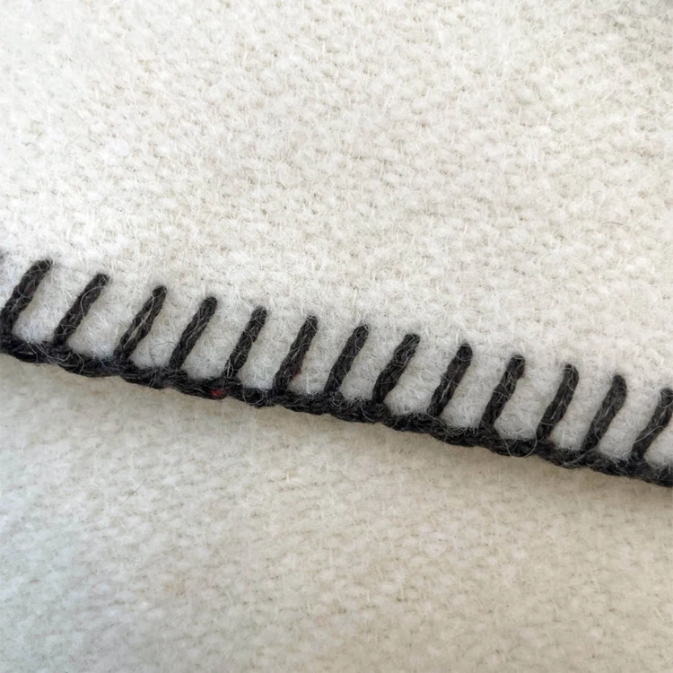 Couverture pure laine vierge naturelle finition point de cheval