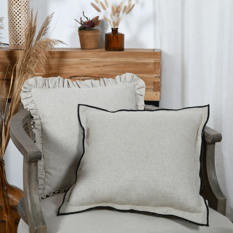 Coussin décoratif en poly-lin finition passepoil contrasté