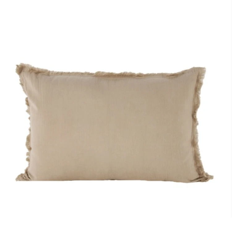 Coussin à franges en coton