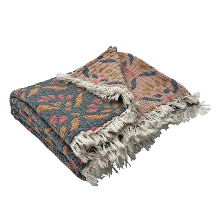 Plaid en gaze de coton lavée à motif végétal