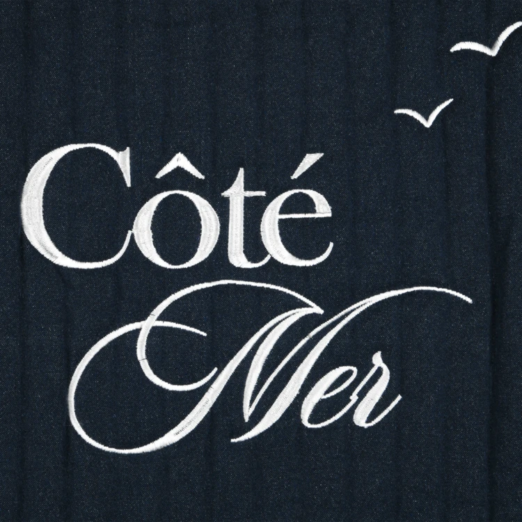 Saco acolchoado em polycotton com um toque marinho