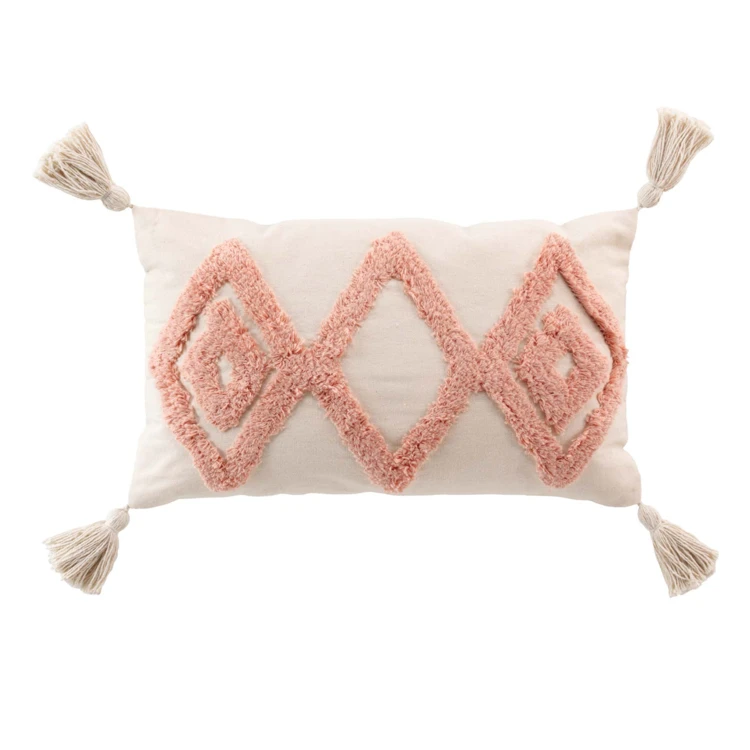 Coussin déhoussable à motifs tuftés