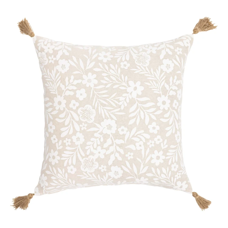 Coussin polycoton imprimé floral à pompons