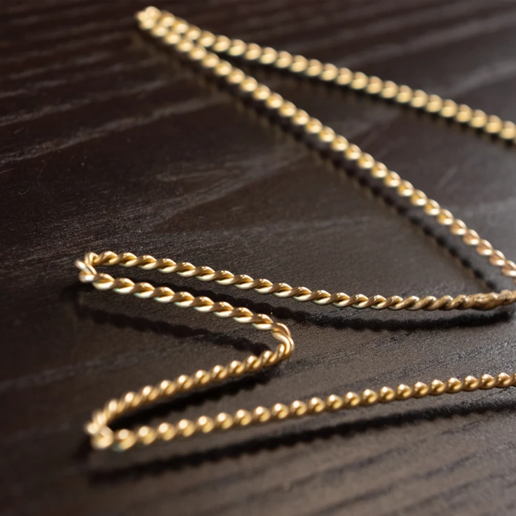 Déco murale Hirondelle fil laiton torsadé