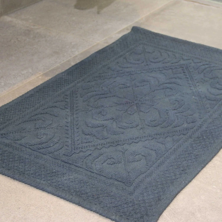 Tapis de bain à motif géométrique