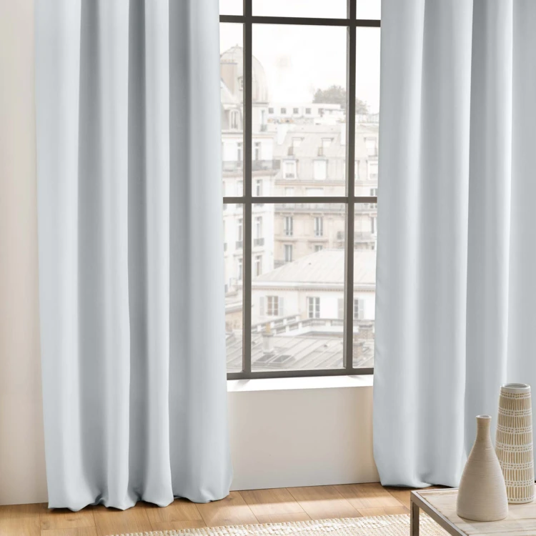 Rideau occultant uni à oeillets