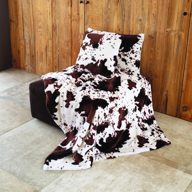 Plaid doux à motif peau de vache avec dos en velours