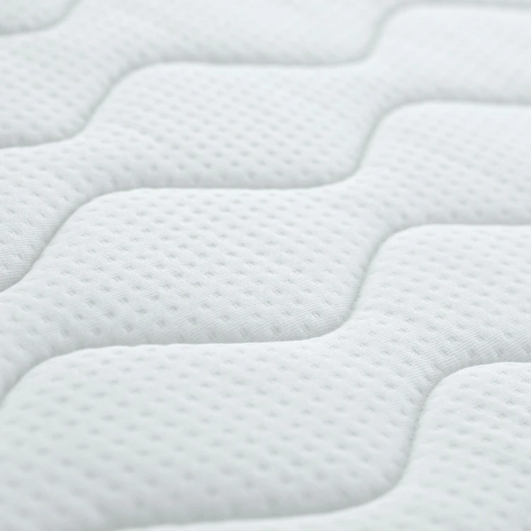 Matelas bébé face été / face hiver avec garnissage laine et soutien ferme