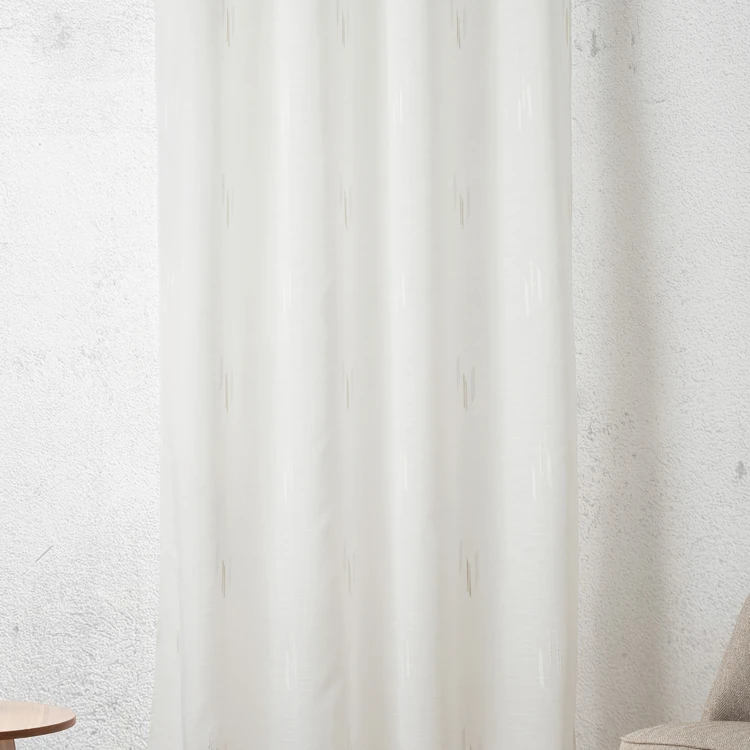 Tissu plombé voile texturé motif fil coupé esprit ikat