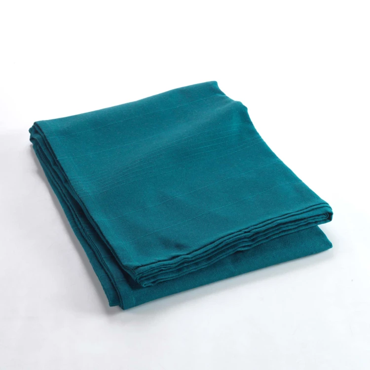 Plaid uni en polycoton pour canapé ou lit