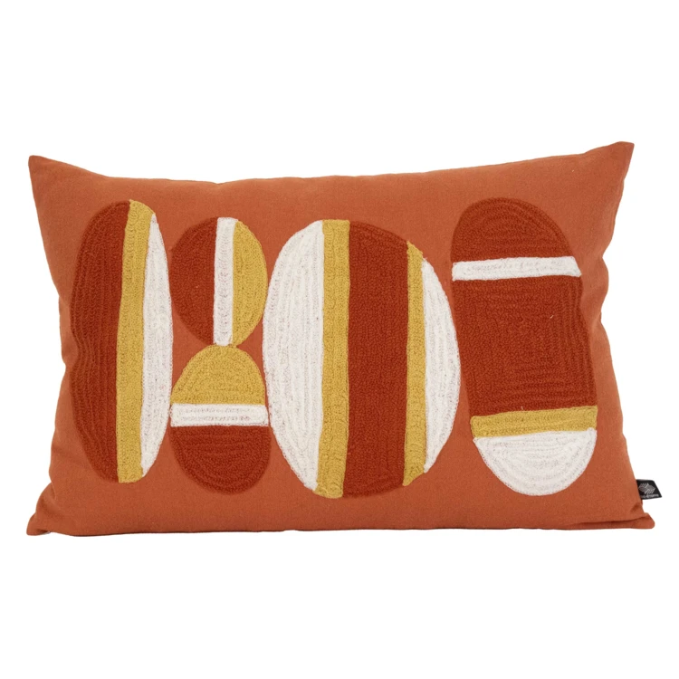 Coussin brodé motif galets de plage