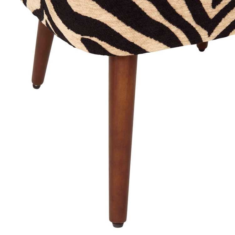 Sillón de chenilla con estampado de cebra