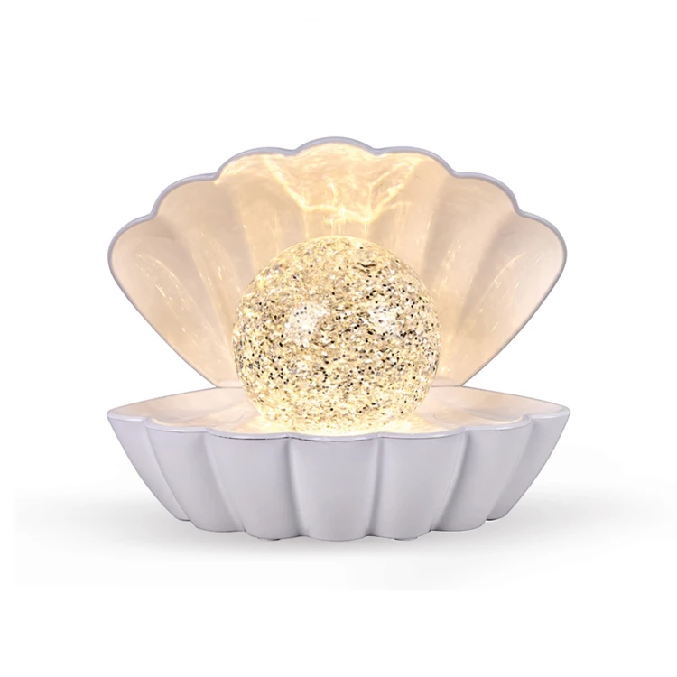 Leuchtende Muschellampe mit Glitzereffekt