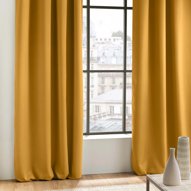 Rideau occultant uni à oeillets