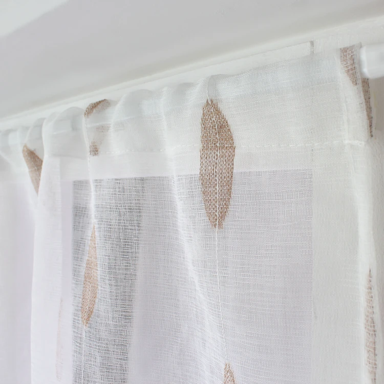 Paire de petits vitrages jacquard motif ovale