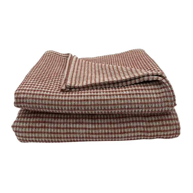 Dessus de lit tissé en coton recyclé motif nid d’abeille