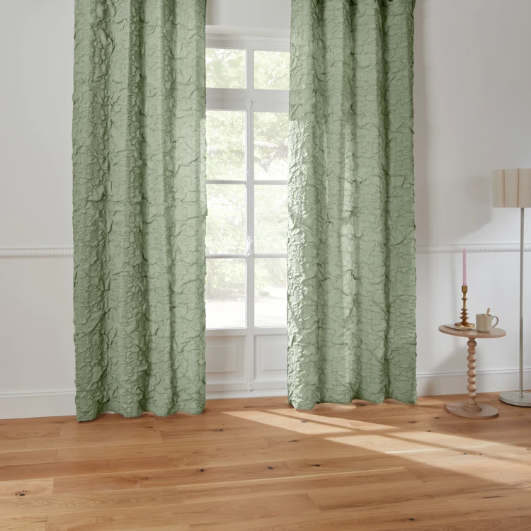 Rideau matelassé à œillets