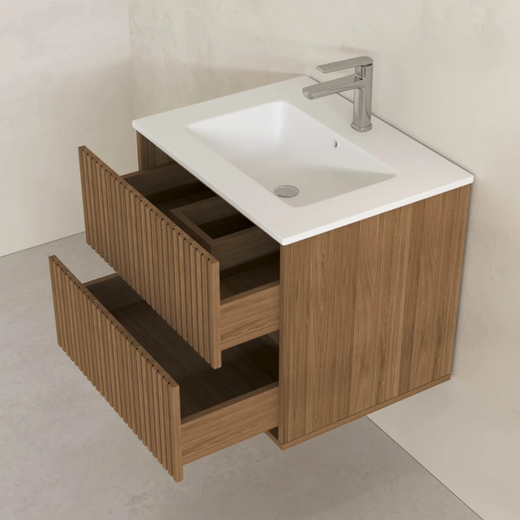 Meuble de salle de bain suspendu avec façade crantée et vasque encastrée