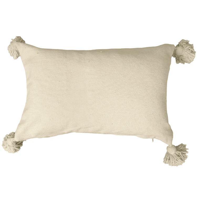 Housse de coussin en laine à pompons