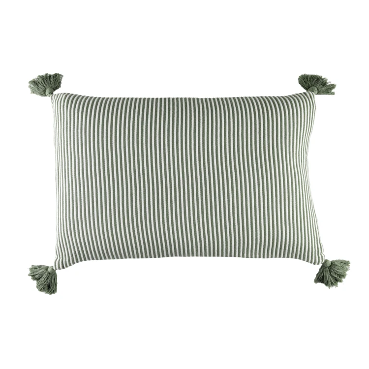 Coussin rayé à pompons