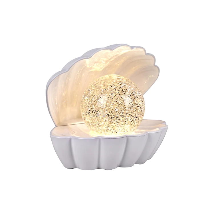 Leuchtende Muschellampe mit Glitzereffekt