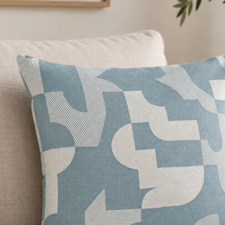 Coussin jacquard géométrique texturé rétro